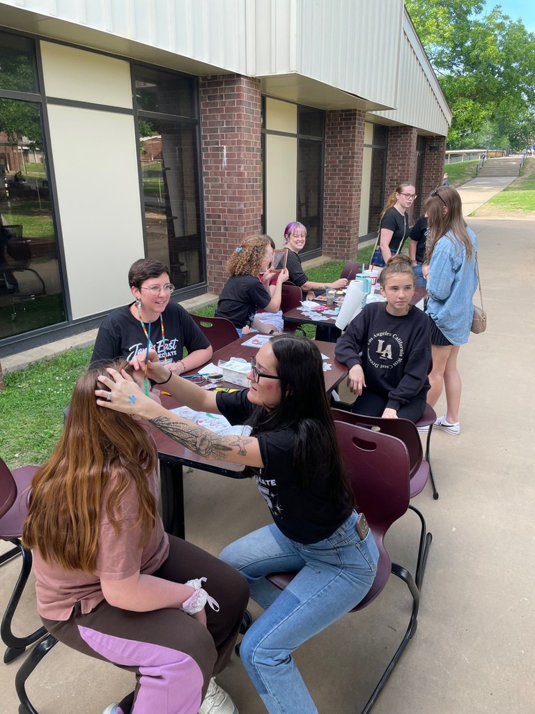 students getting faces painted at the celebration of learning