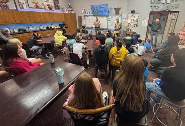 students listening to a presentation 