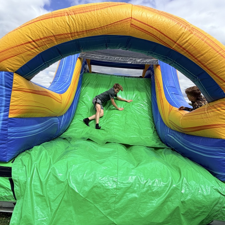 student on inflatable 