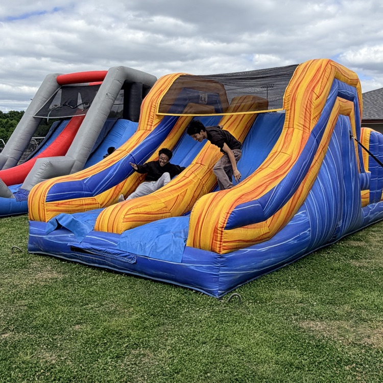 students on inflatable 