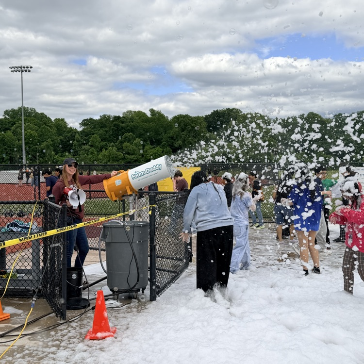 Ms Toy blasting students with bubbles 