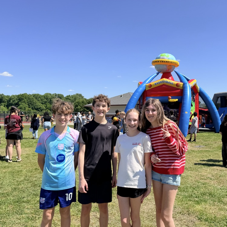 4 students posing for a picture 