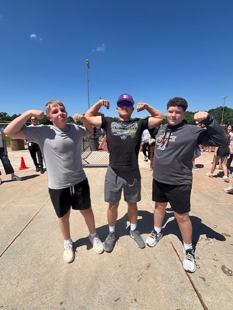 3 boys posing 
