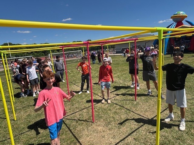 students smiling during 9-square game