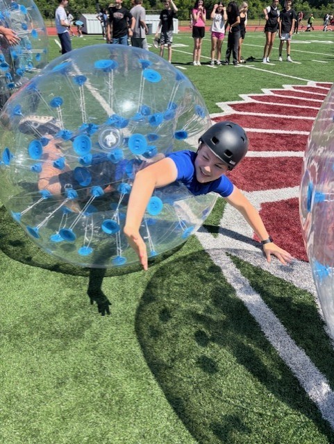 student in inflatable soccer game