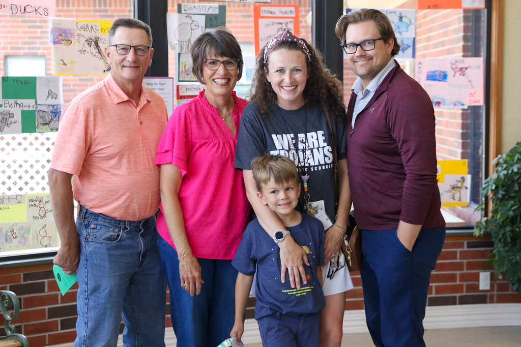 teacher of the year macy worley with her husband and son and his grandparents. 