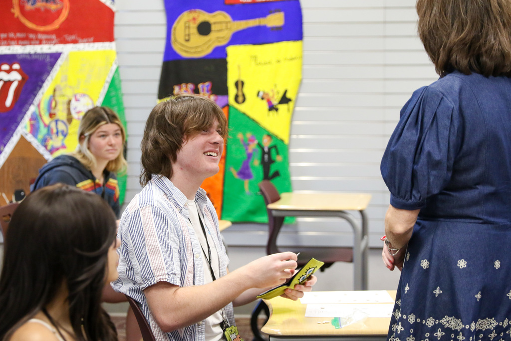 student smiling up at dr. butterfield