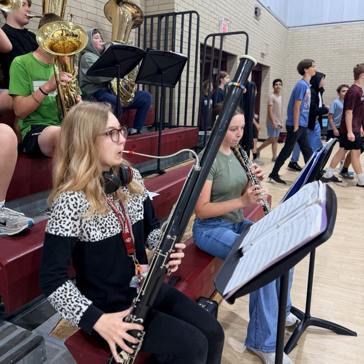 student playing band instrument