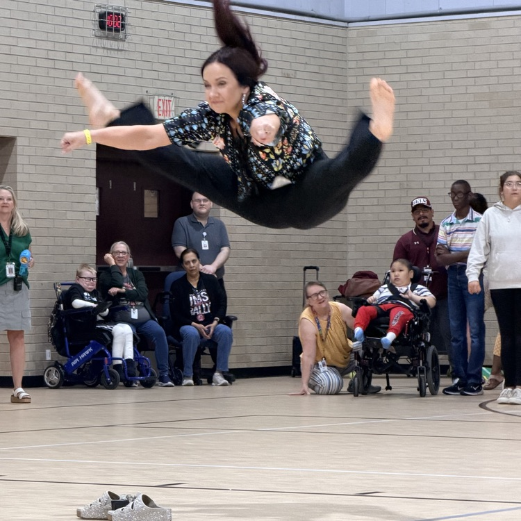 Ms Baty doing a toe touc 