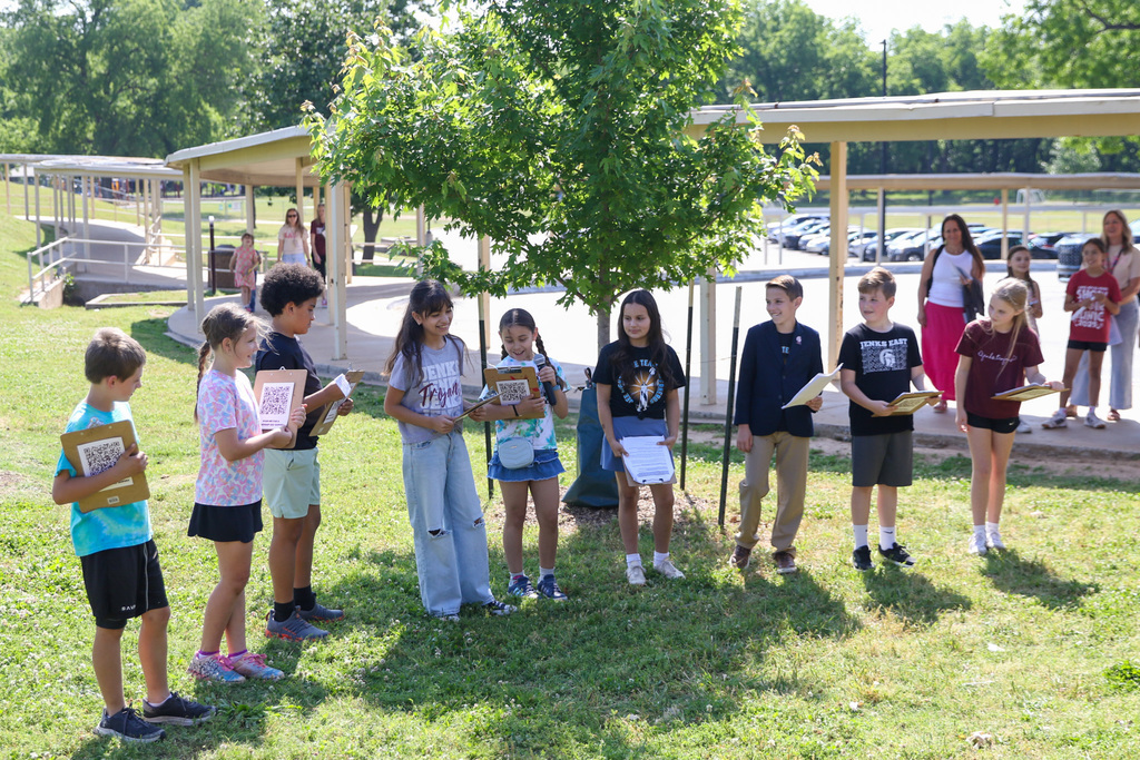 kids talking about the end of the tour about the tree they planted
