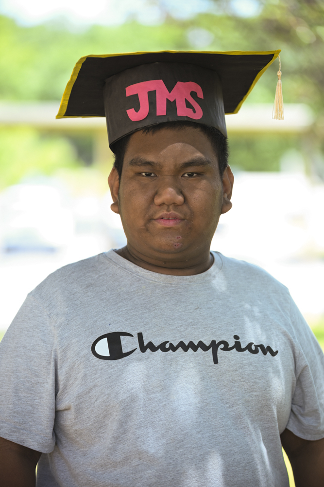 Student in JMS graduation cap