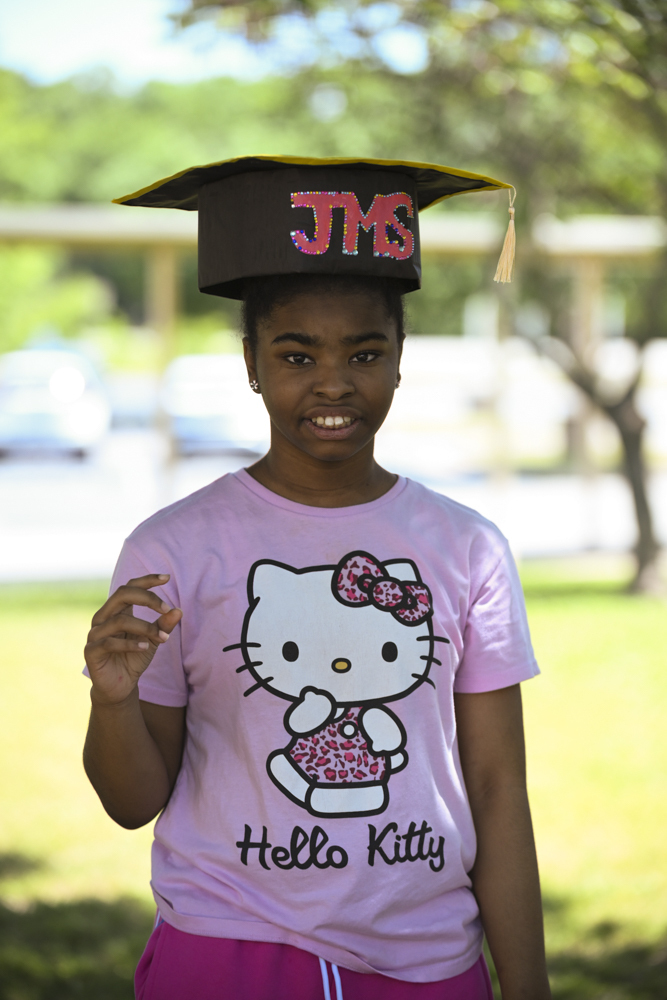 Student in JMS graduation cap