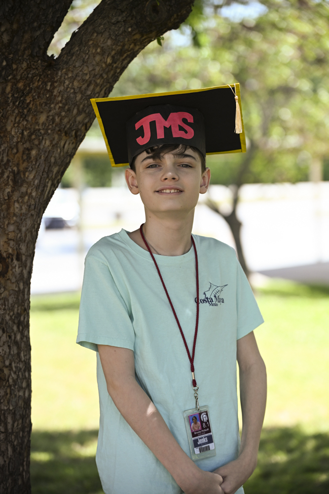 Student in JMS graduation cap