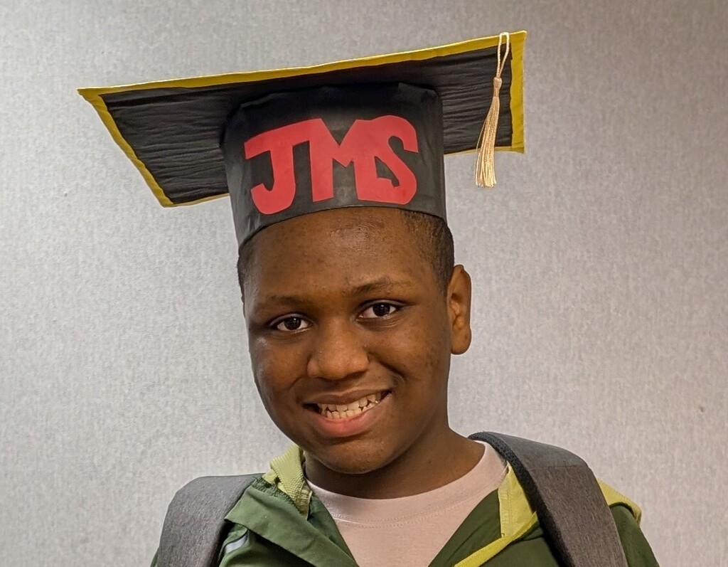 Student in JMS graduation cap
