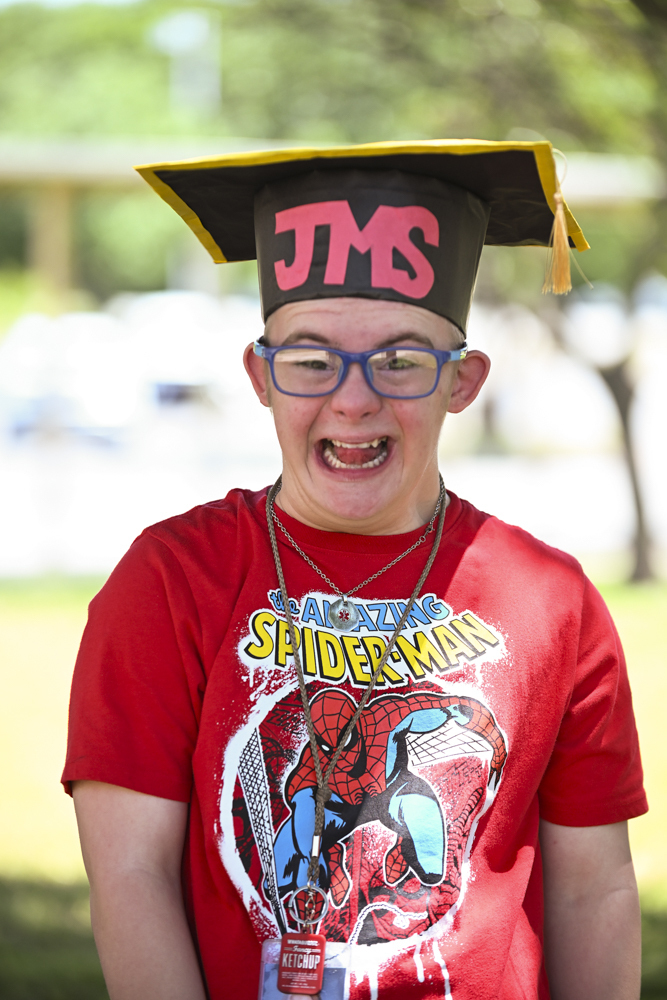 Student in JMS graduation cap