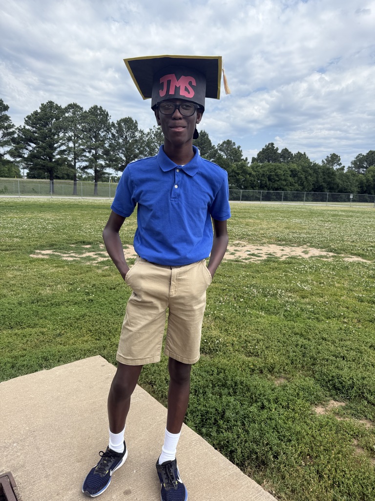 Student in JMS graduation cap