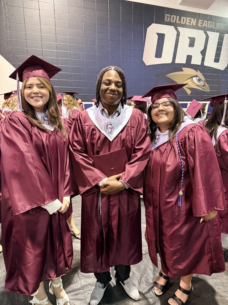 students in their graduation gowns