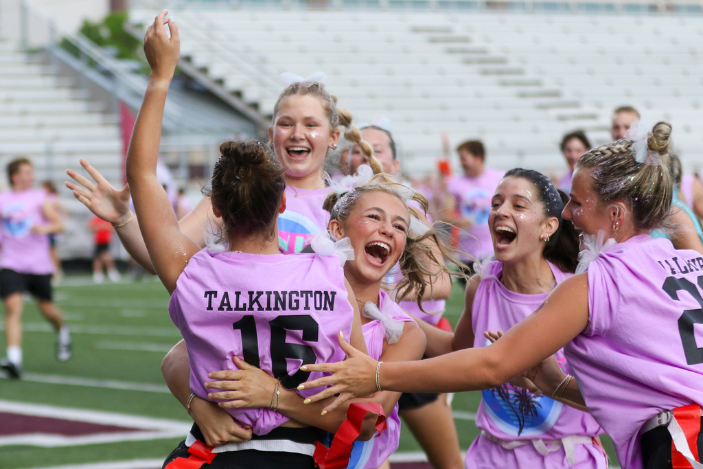 junior girls celebrating a touchdown in the end zone