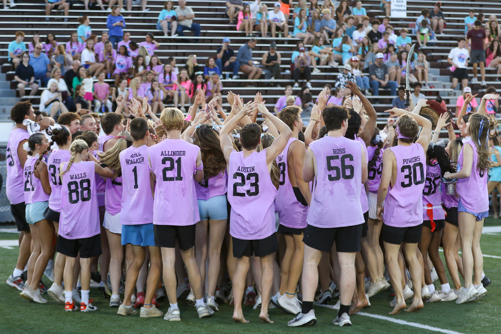 juniors huddled around at the end celebrating their win