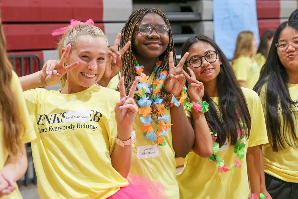 three 8th grade girls posing for a photo