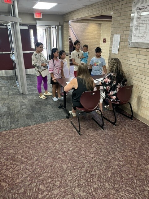 families arriving at Meet the Teacher