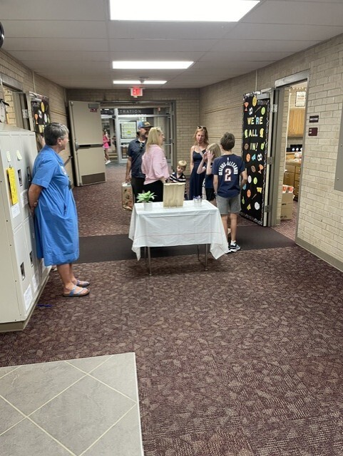 students and families meeting their teachers at Meet the Teacher