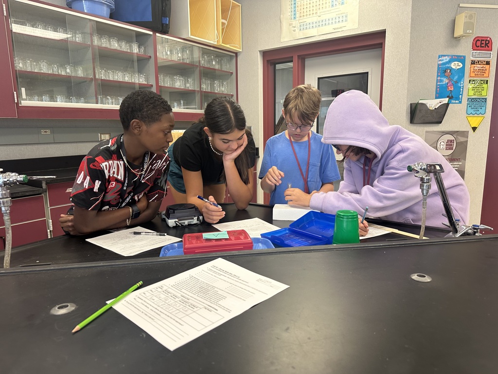 students working together of styrofoam experiment