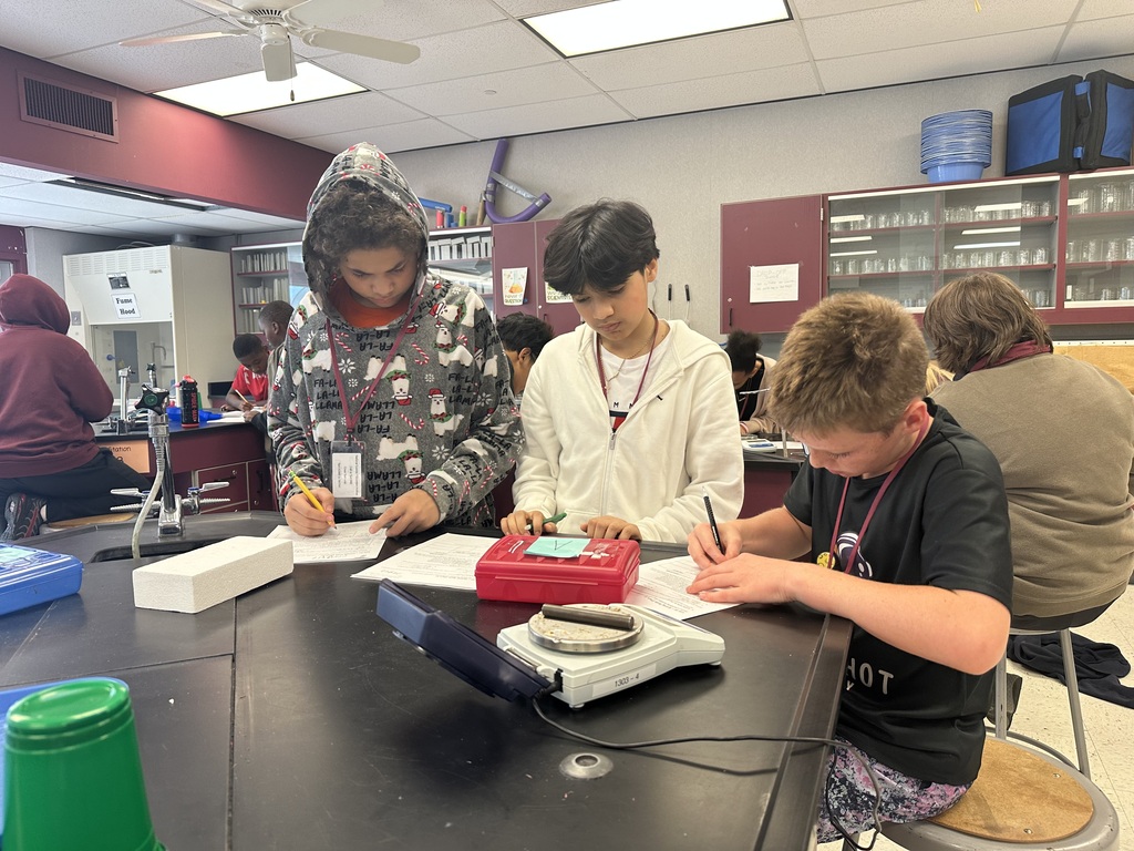 students working together of styrofoam experiment