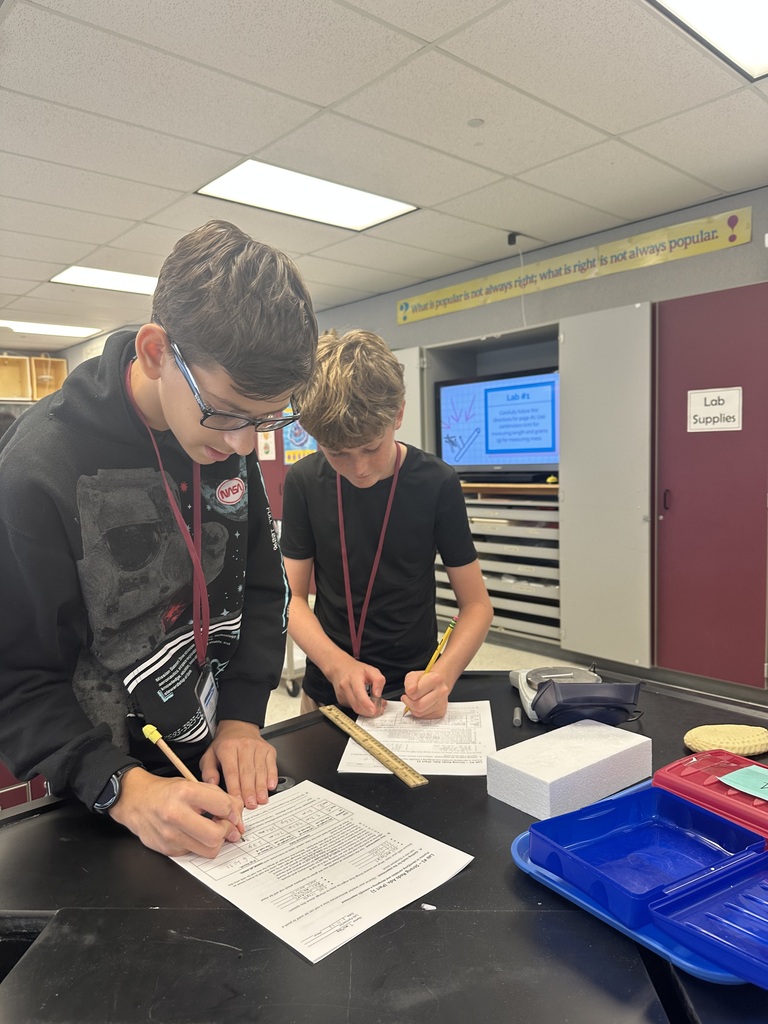 students working together of styrofoam experiment