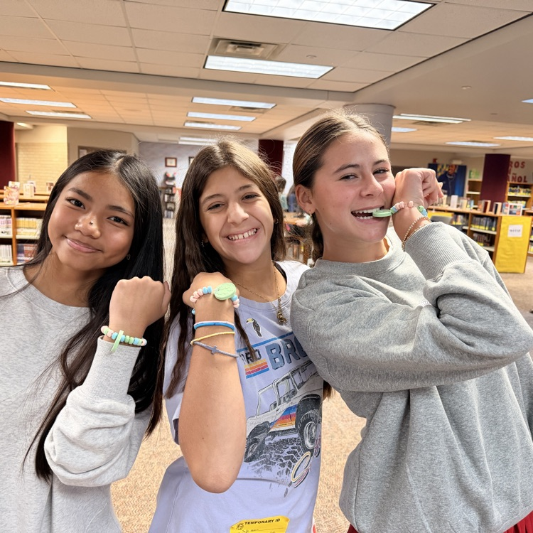 3 girls with candy soccer bracelets