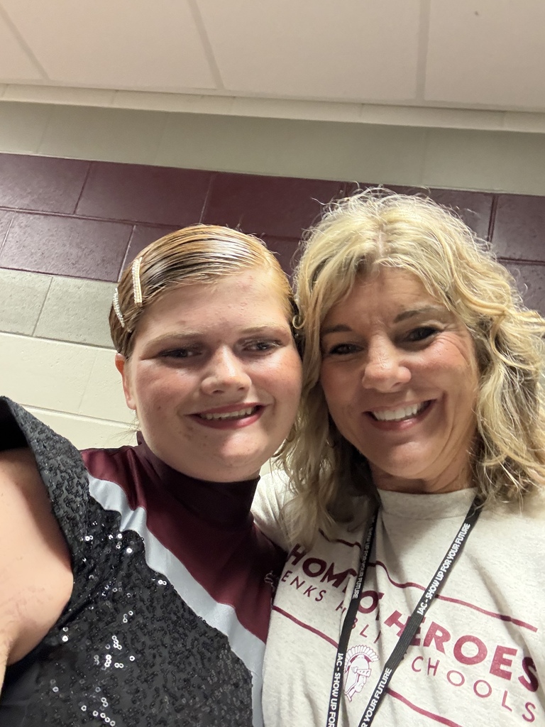 A student in Guard and Ms. Hardy