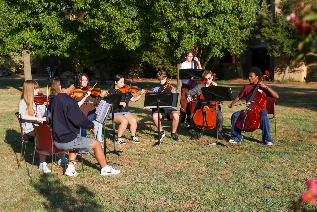 the jhs orchestra playing in memory of those taken too soon