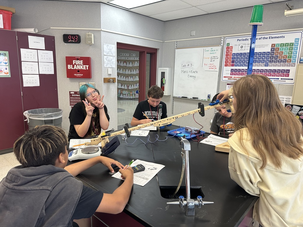Students working on a lab table project