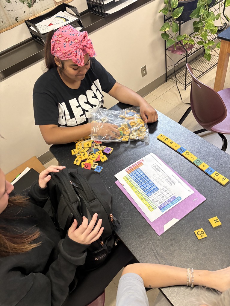 students using tiles to study the periodic table 
