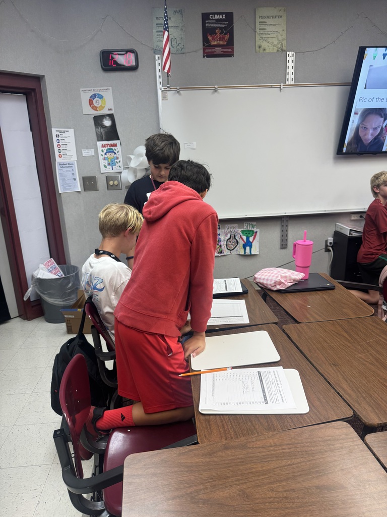 students working a grammar scavenger hunt