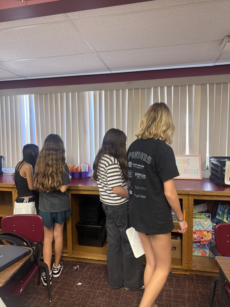 students working a grammar scavenger hunt