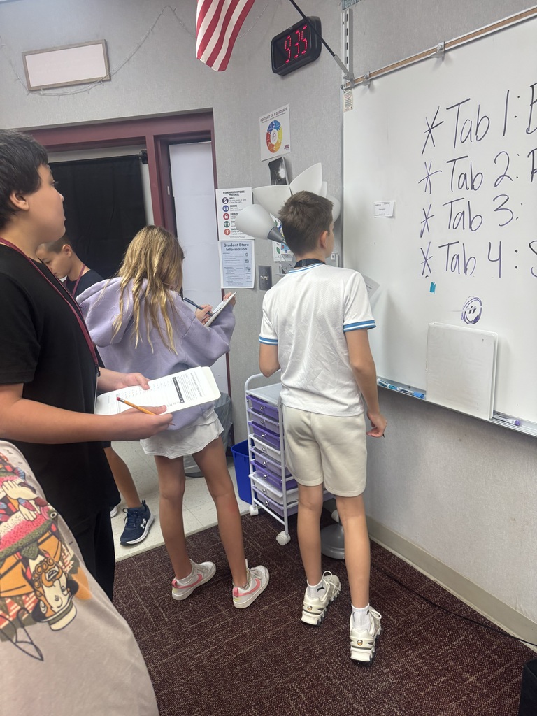 students working a grammar scavenger hunt