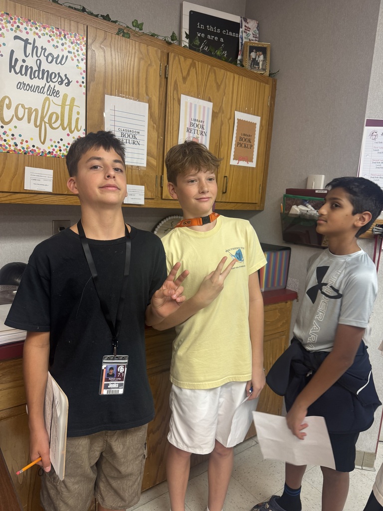 students working a grammar scavenger hunt