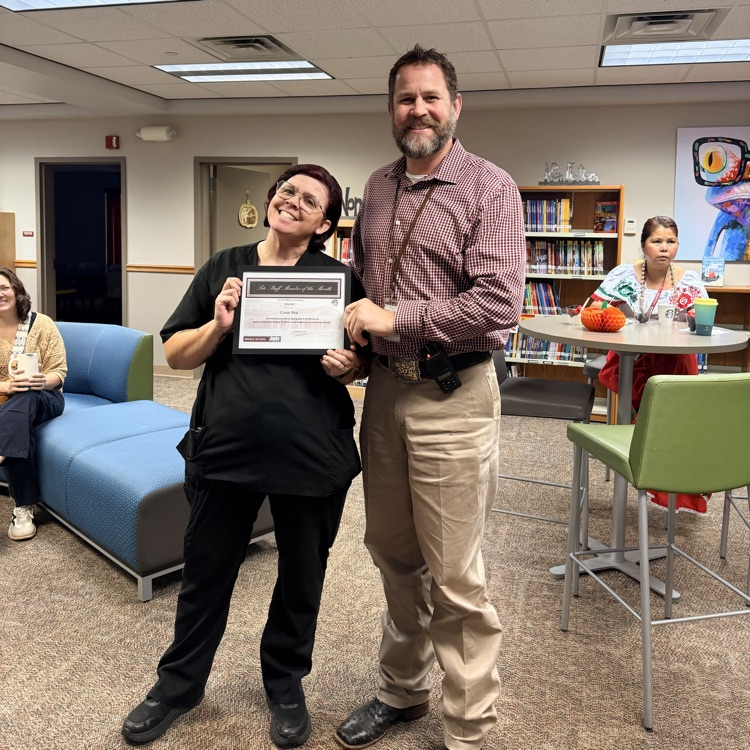 teacher receiving award