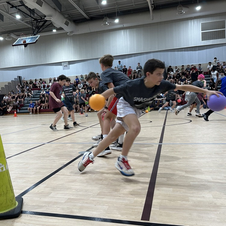 students gathering dodgeball’s