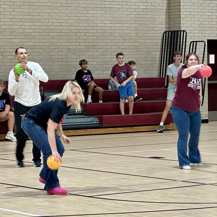seventh grade teachers preparing to throw dodgeball