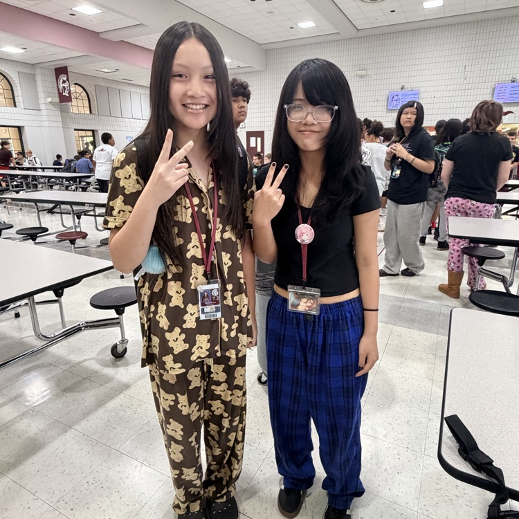 two students wearing pajamas