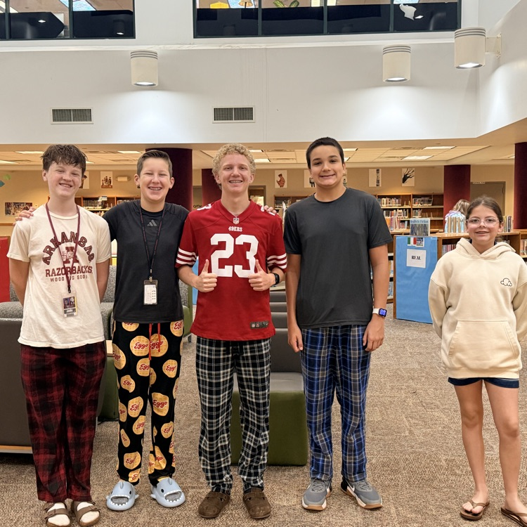 five student council officers wearing pajamas