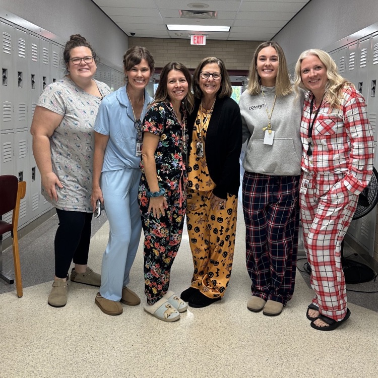 six teachers wearing pajamas