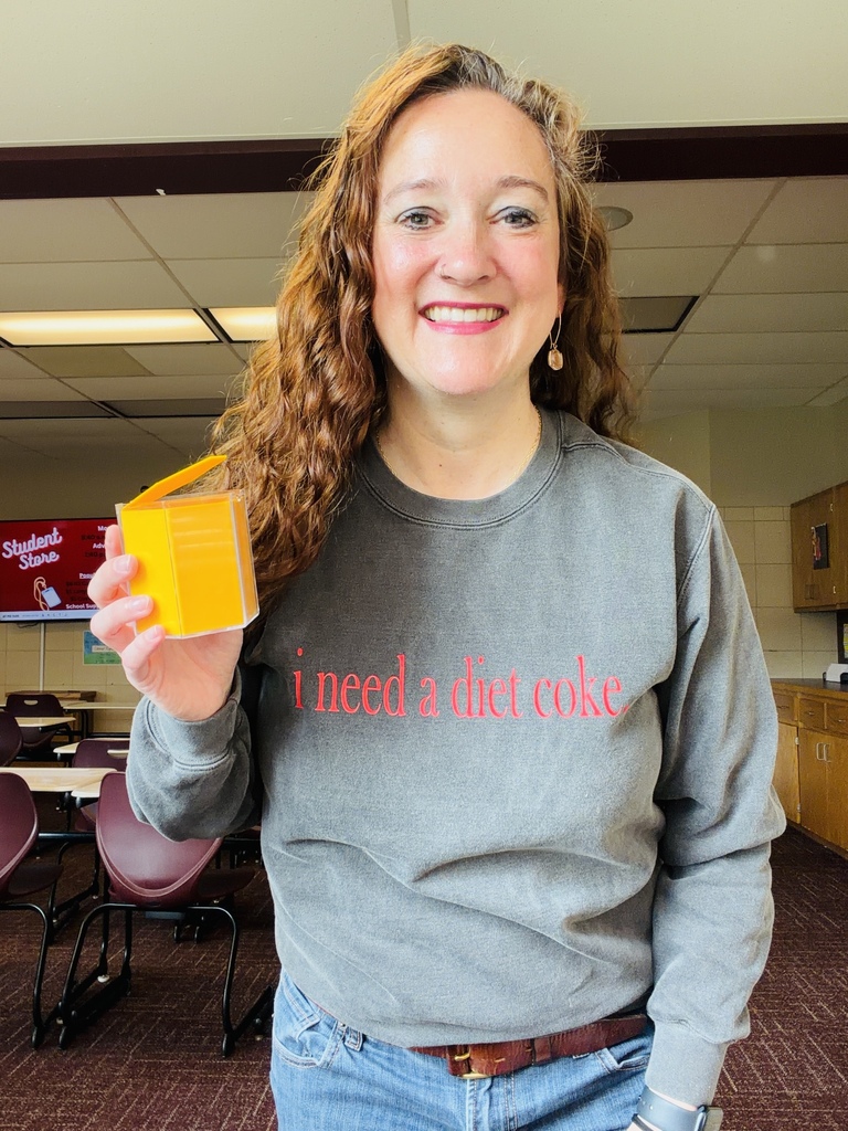 Ms. Johnson holding her "not a cup"
