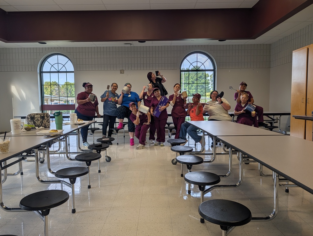 our cafeteria staff showing off their "not a cup"