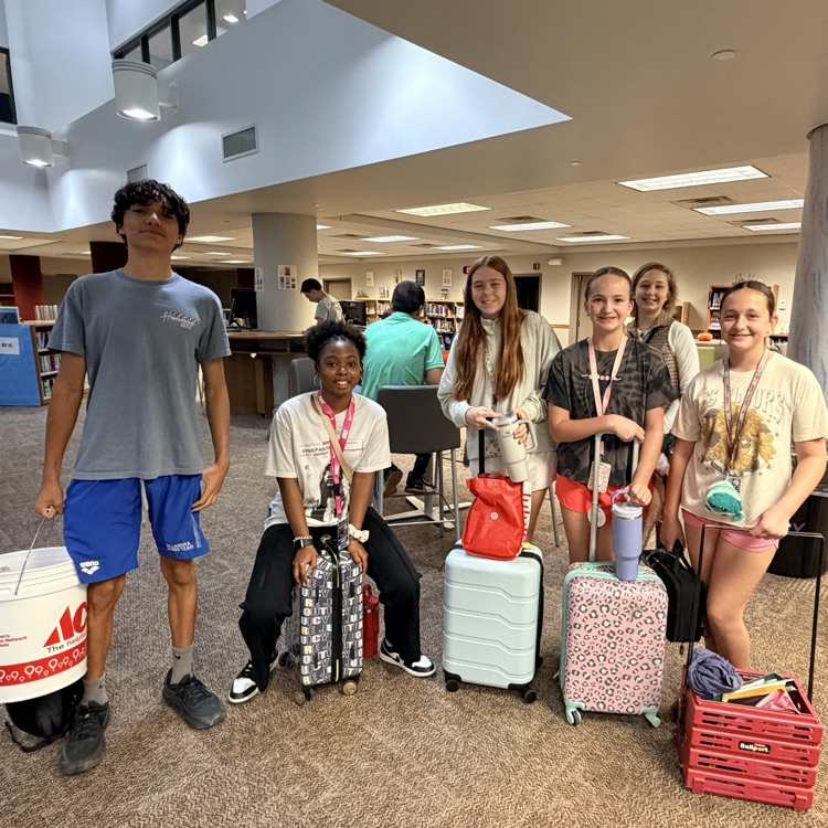 six students showing off there anything but a backpack