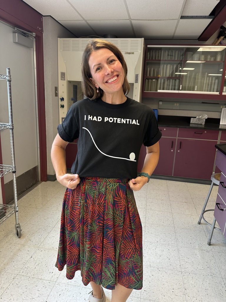 Mrs. Swift showing off her science shirt
