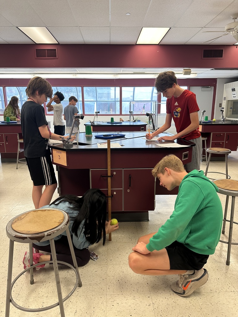 students working on science lab