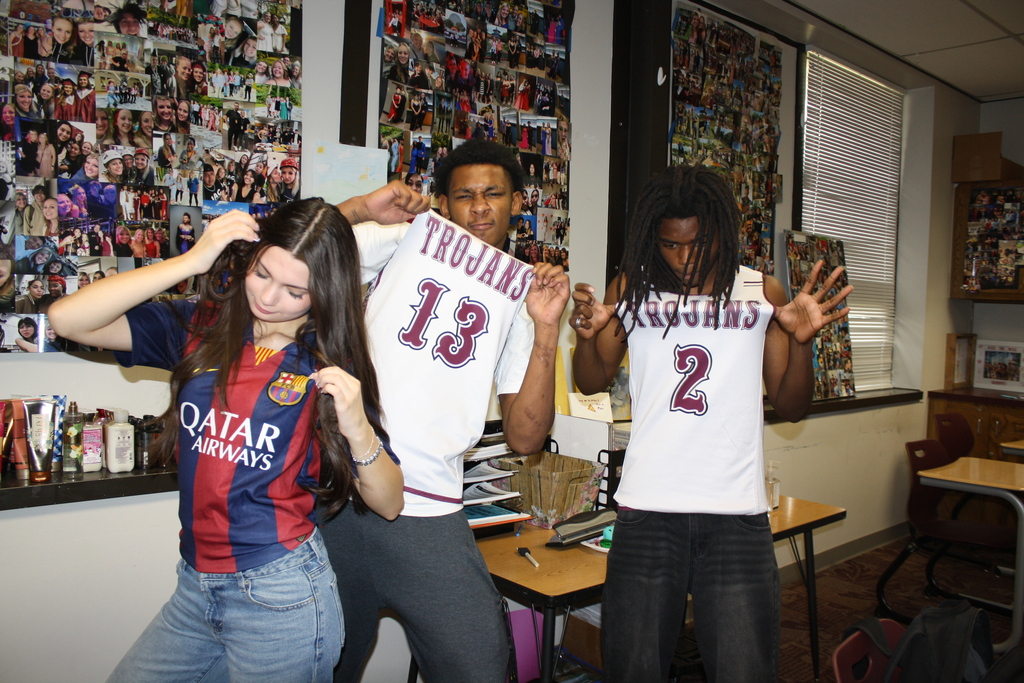 3 students in jerseys